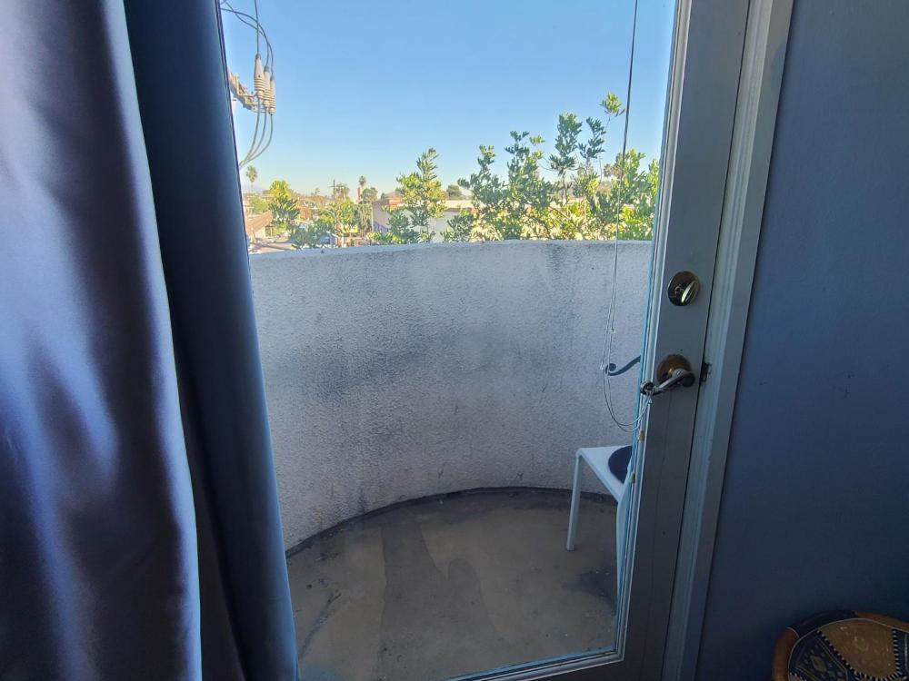 Guest Room in Sherman Oaks with private bathroom and balcony